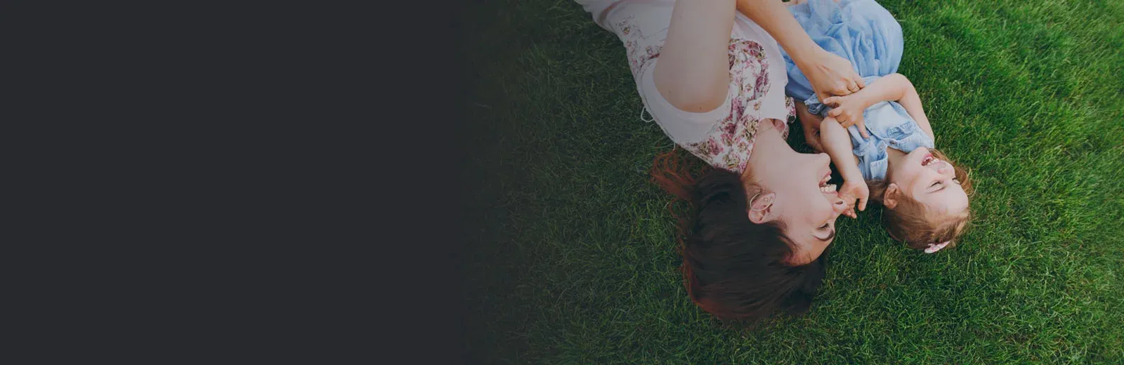 Family playing in the grass